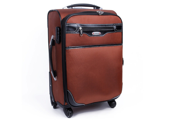Le nylon et valise en cuir d'unité centrale la grande sur le chariot à roues enferment le bagage pour le voyage, sports